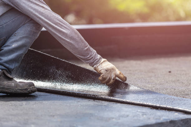 Professional Basement Waterproofing technician working in Meadows Place, TX